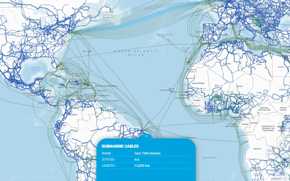 The ITU infrastructure connectivity map across the North Atlantic, dense blue terrestrial and submarine routes with a popup naming one cable and its length.