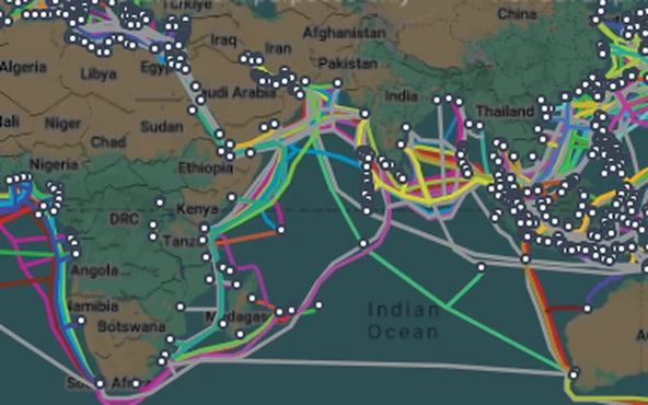The TeleGeography submarine cable map across Africa, the Middle East and the Indian Ocean, multicoloured cable routes converging on white landing point markers.